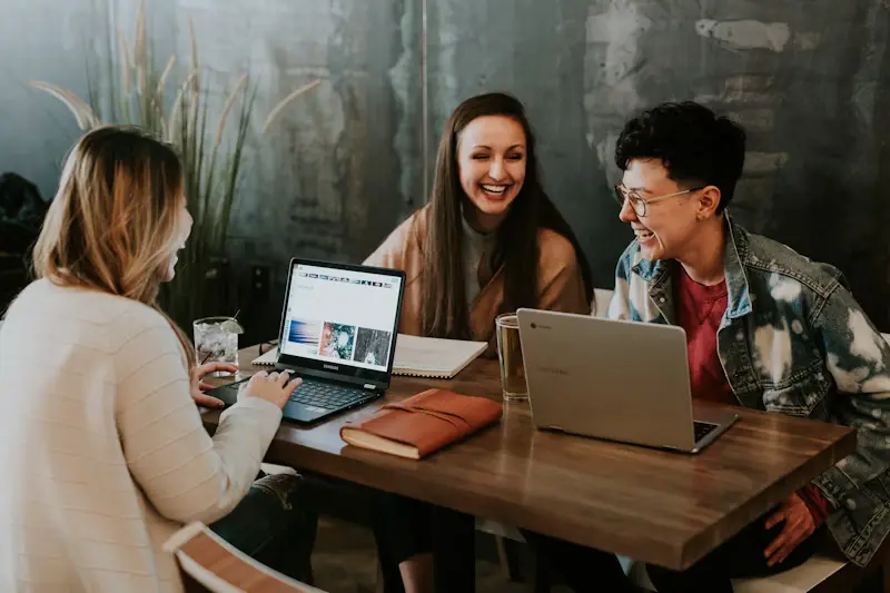 Our Team - Tech professionals collaborating in a modern workspace